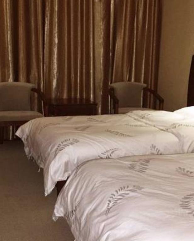 Шанграо: Tenglong Business Hotel