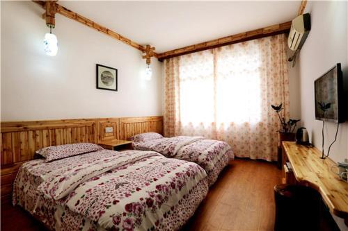 Чжанцзяцзе: Qininn Zhangjiajie Xiangyu Store