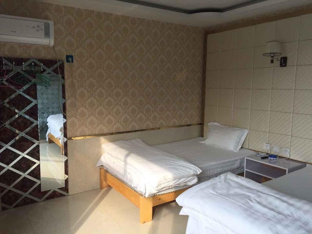 Цзинин: Jining Liangshan Rujia Family Inn