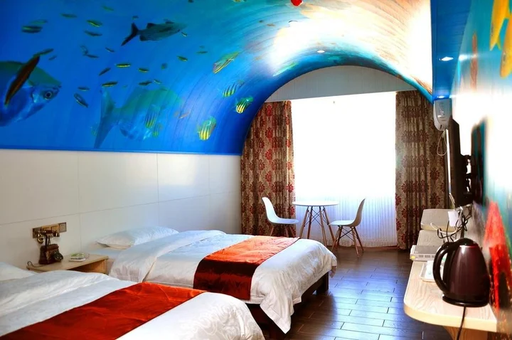 Чжанцзяцзе: Seven Plus One Theme Inn