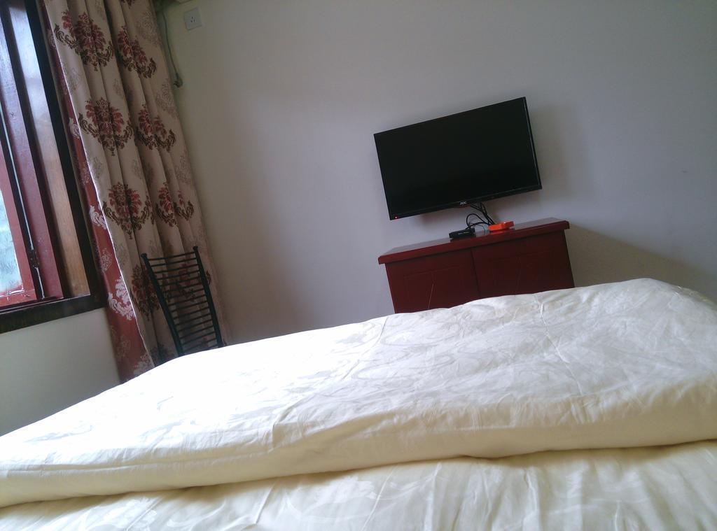 Лешан: Emeishan Danshen Apartment
