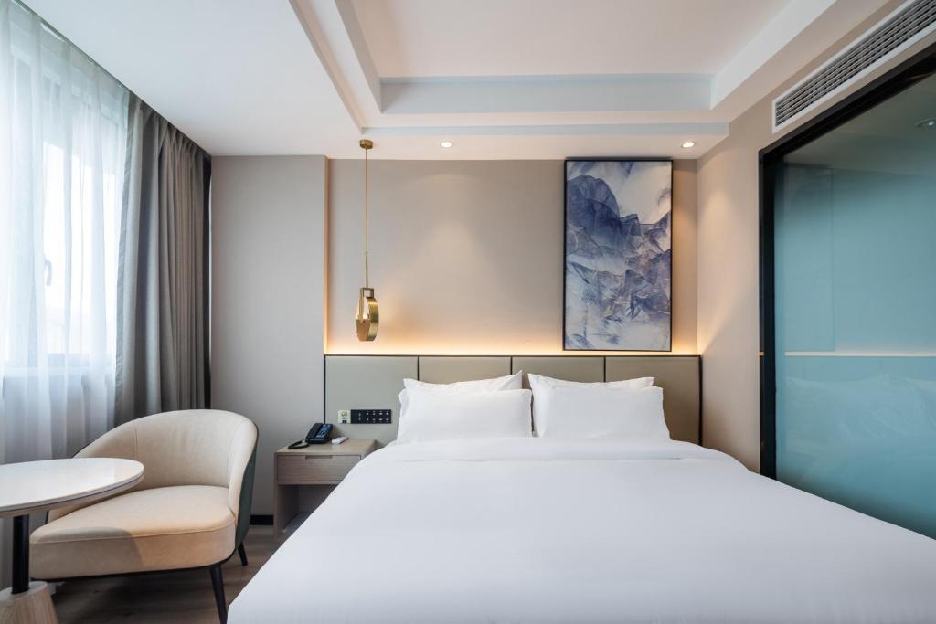 Лишуй: Xinhuating Business Hotel