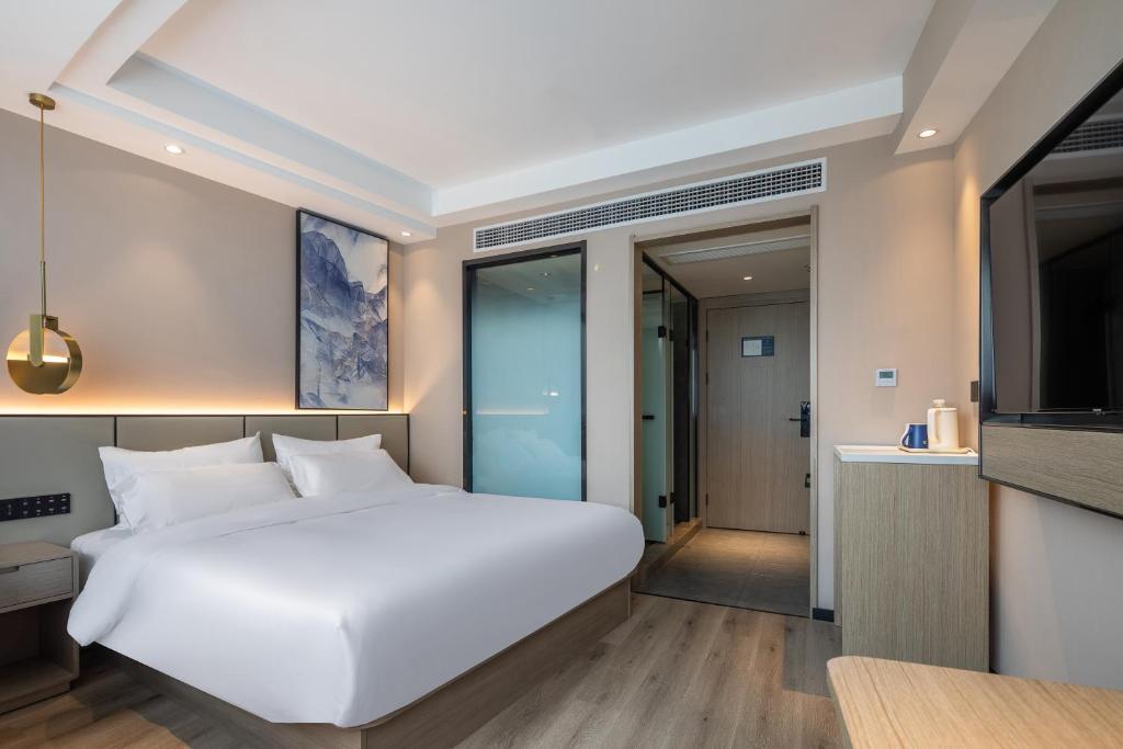 Лишуй: Xinhuating Business Hotel