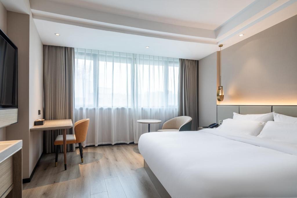 Лишуй: Xinhuating Business Hotel