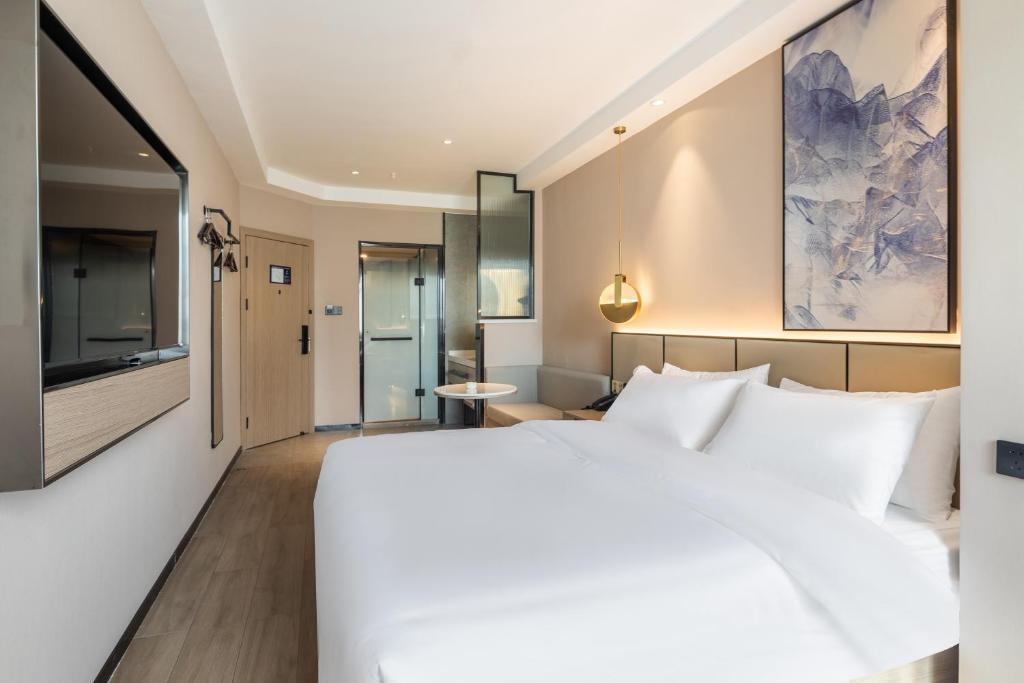 Лишуй: Xinhuating Business Hotel