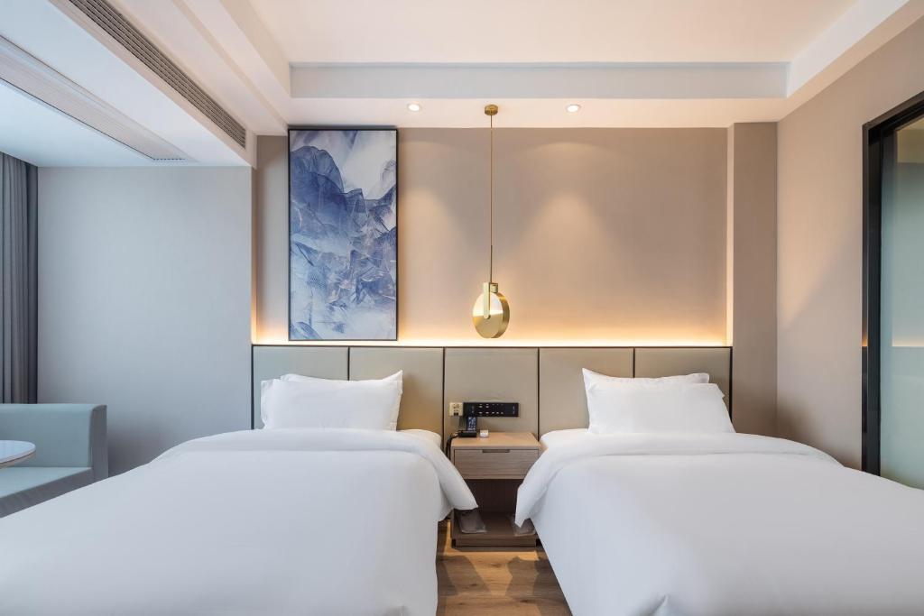 Лишуй: Xinhuating Business Hotel