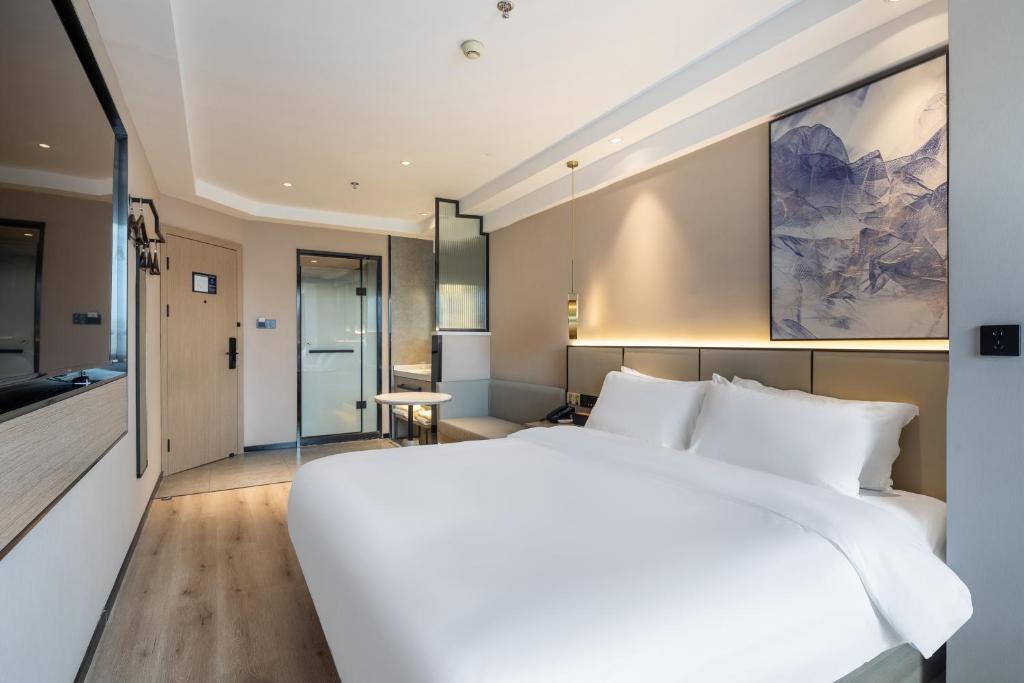Лишуй: Xinhuating Business Hotel