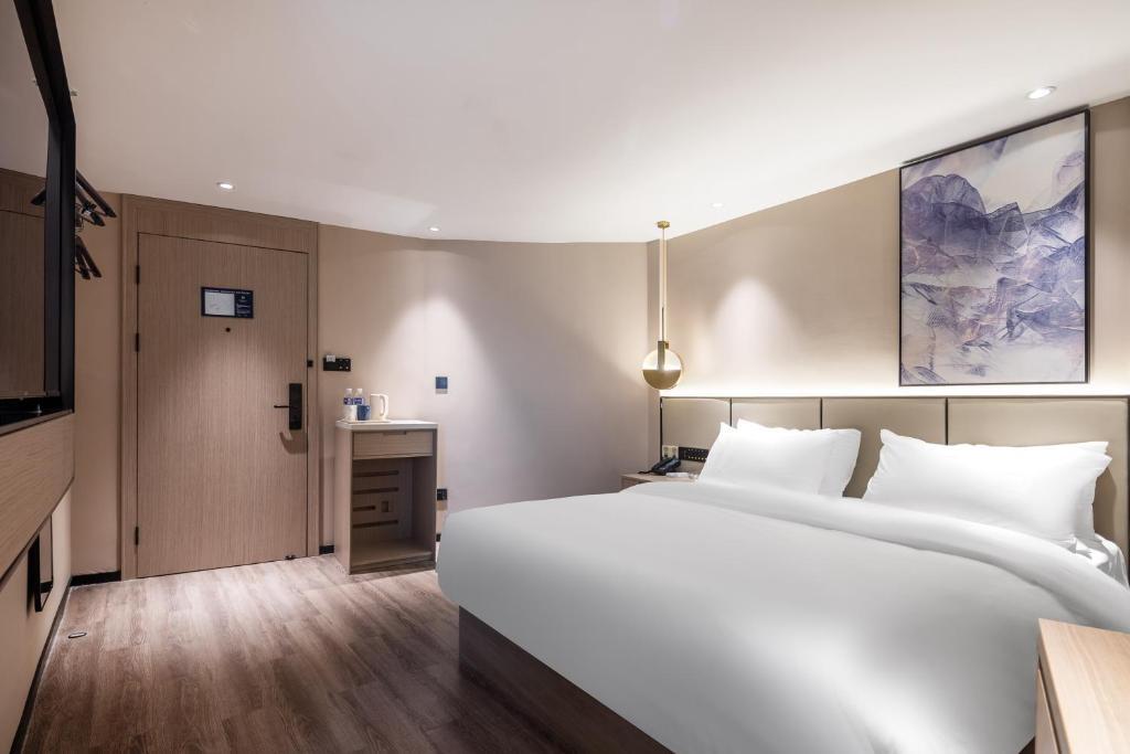 Лишуй: Xinhuating Business Hotel