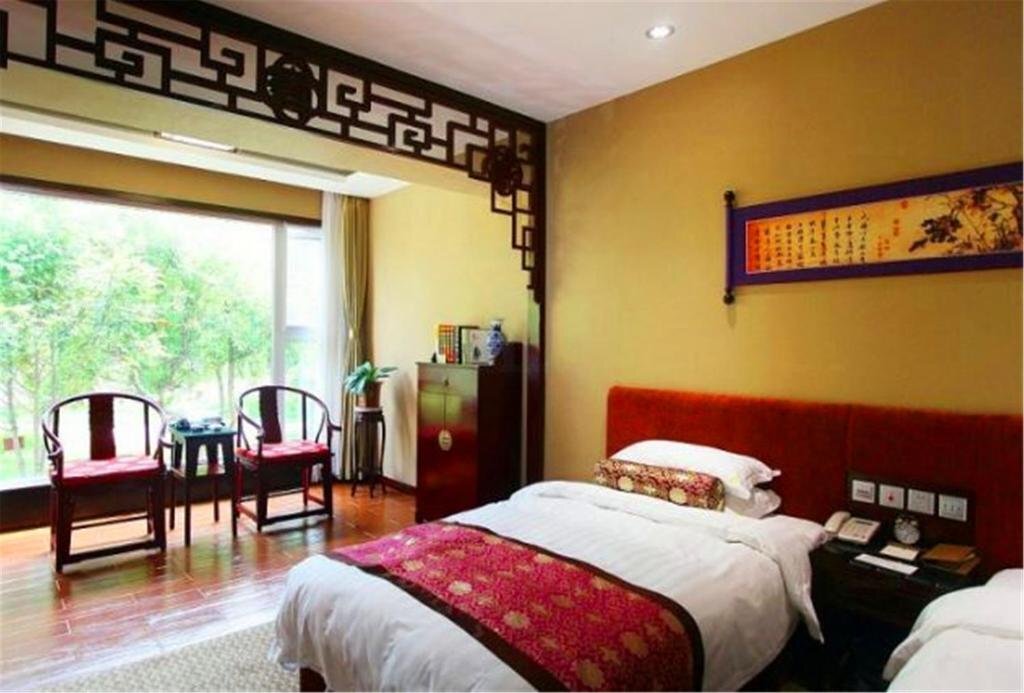 Цзинин: Qufu Mingzuo Xingtan Hotel