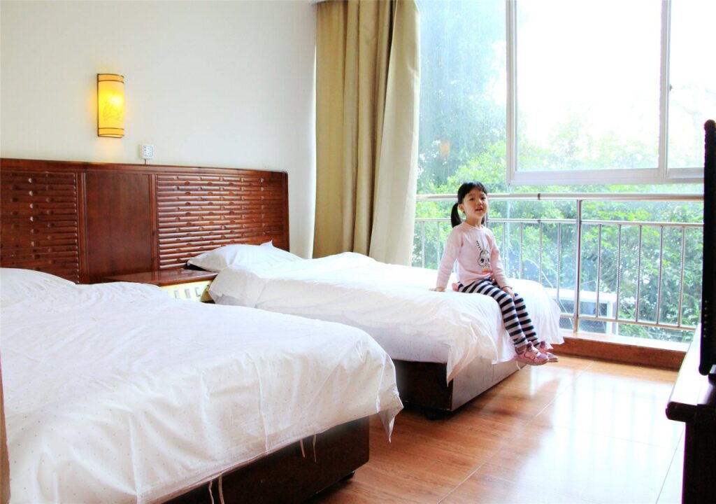 Гуйлинь: Guilin La Flowers Hostel