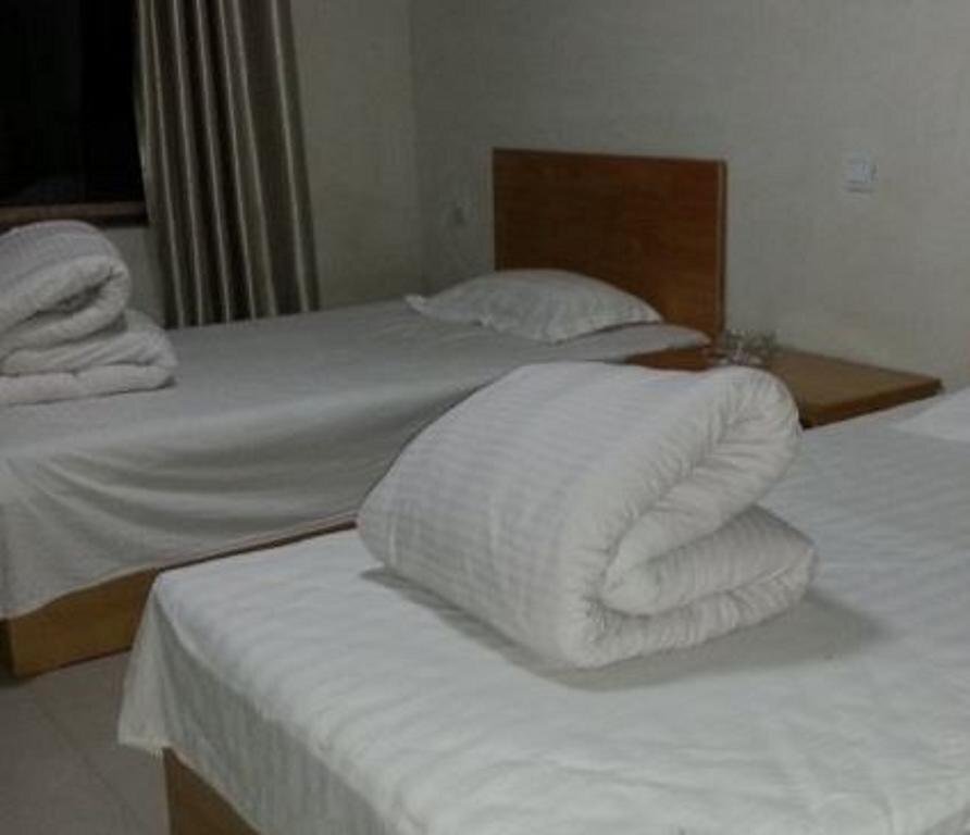 Суцянь: Suqian Mingguang Hotel