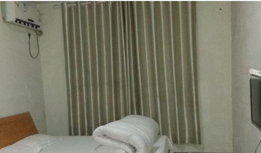 Суцянь: Suqian Mingguang Hotel