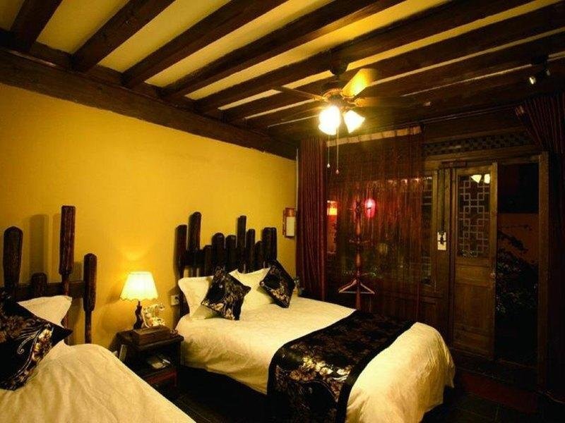 Лицзян: Lijiang Yunjin Yaju Courtyard Hotel