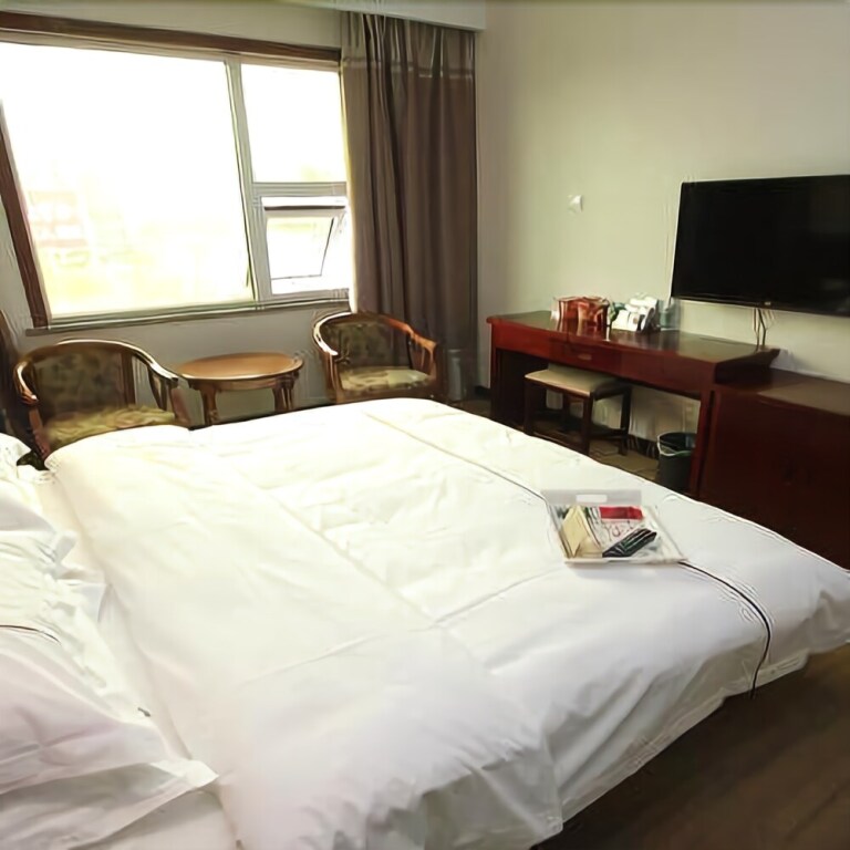 Цзинин: Jining Yutang Hotel