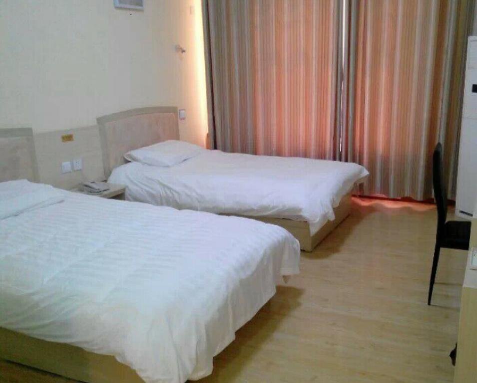 Цзинин: Sishui Haichang Business Hotel