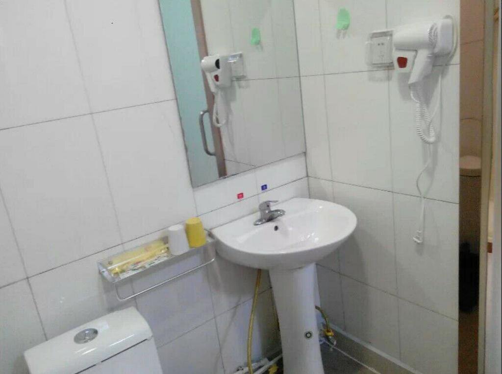 Цзинин: Sishui Haichang Business Hotel