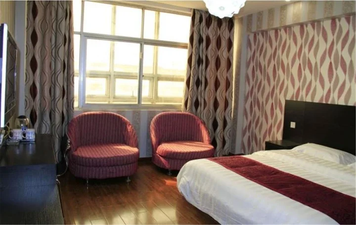 Хецзе: Heze E Home Business Hotel