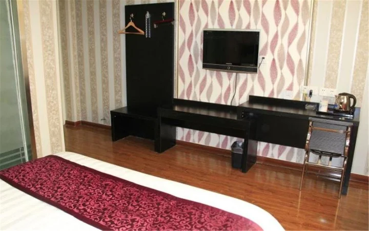 Хецзе: Heze E Home Business Hotel