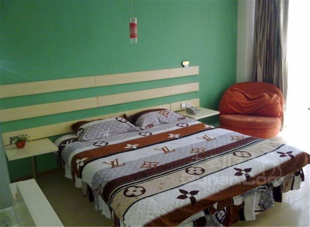 Хецзе: Heze E Home Business Hotel