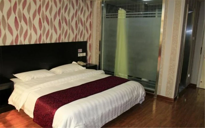 Хецзе: Heze E Home Business Hotel