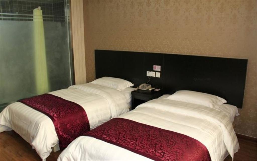 Хецзе: Heze E Home Business Hotel