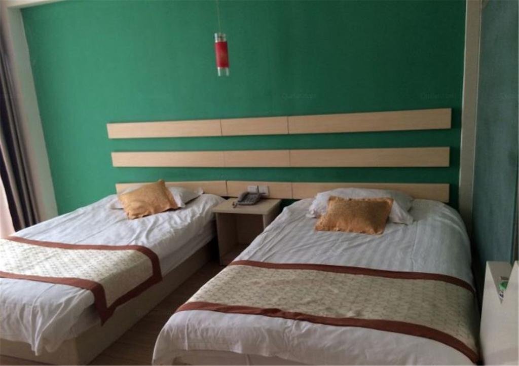 Хецзе: Heze E Home Business Hotel