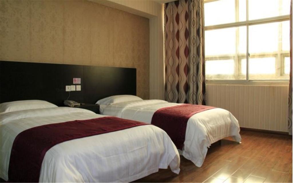 Хецзе: Heze E Home Business Hotel