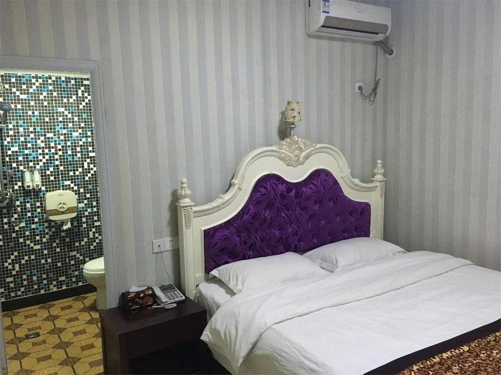 Луань: Shuntai Business Inn