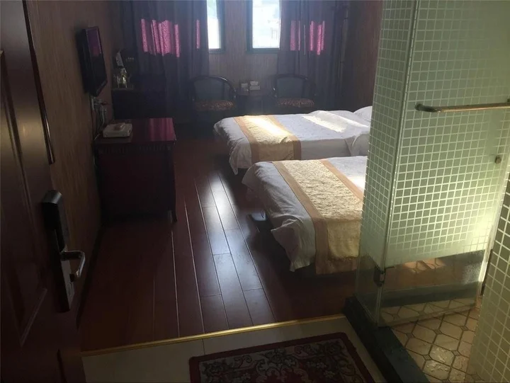 Луань: Shuntai Business Inn