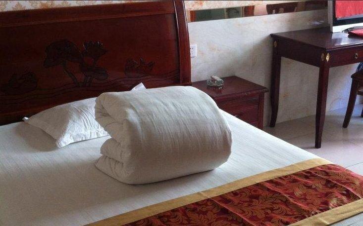 Луань: Shuntai Business Inn