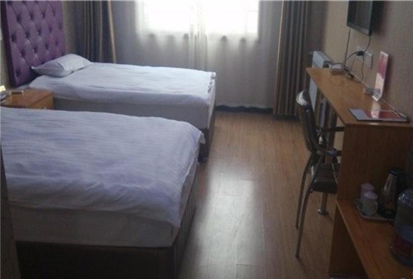 Линьи: Linshu Mingman Business Inn