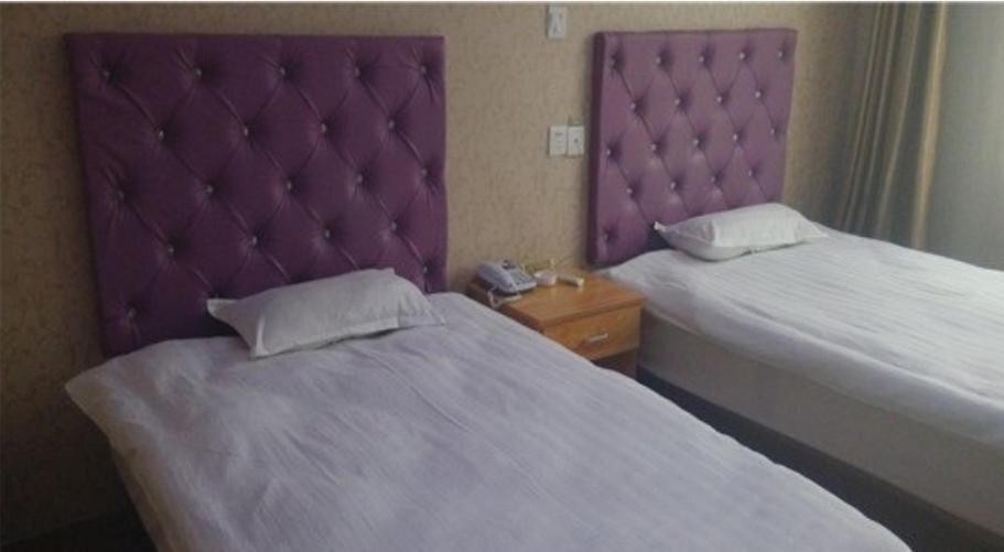 Линьи: Linshu Mingman Business Inn