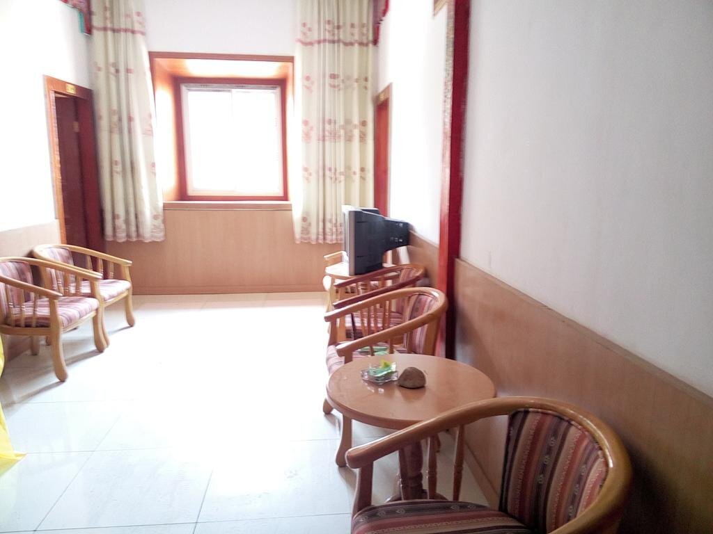 Дабба: Daocheng Xiangpica Inn