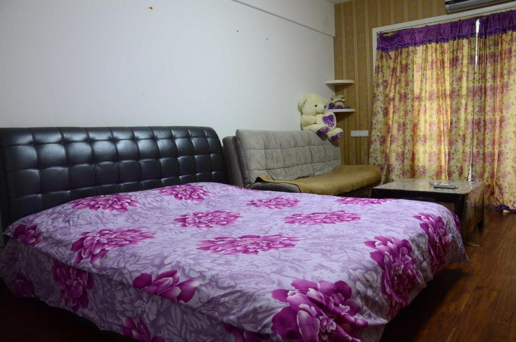 Чанша: Yijia Apartment