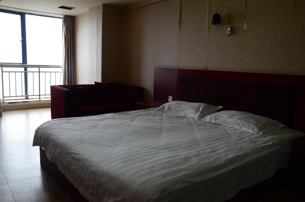 Чанша: Yijia Apartment