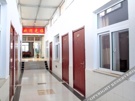 Хулудао: Xingcheng Xinli Family Inn