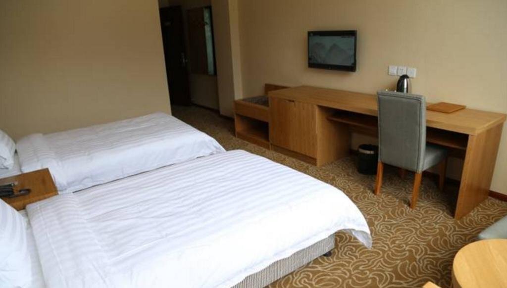 Линжи: Linzhi Yonghui Business Hotel