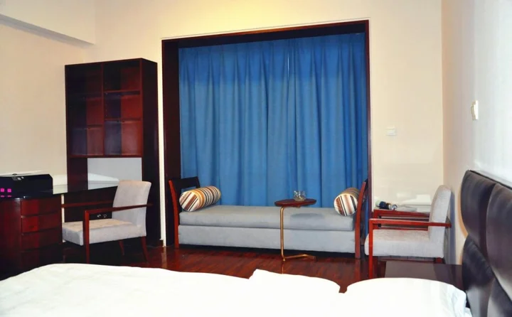 Циндао: QingDao JinShan We Holiday Apt Olympic C