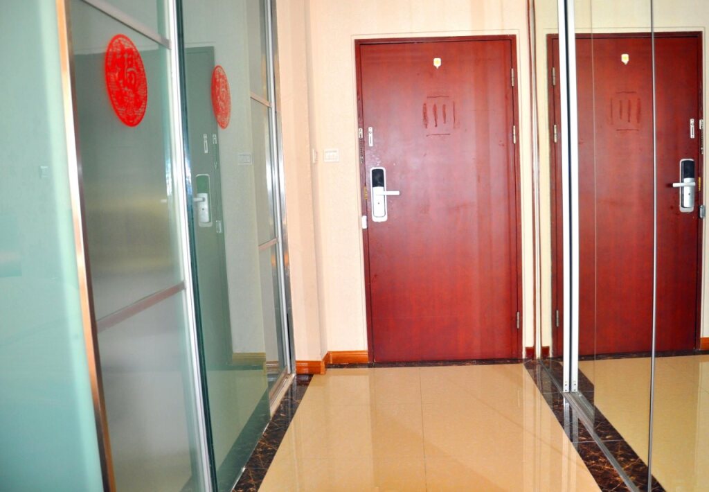 Циндао: QingDao JinShan We Holiday Apt Olympic C
