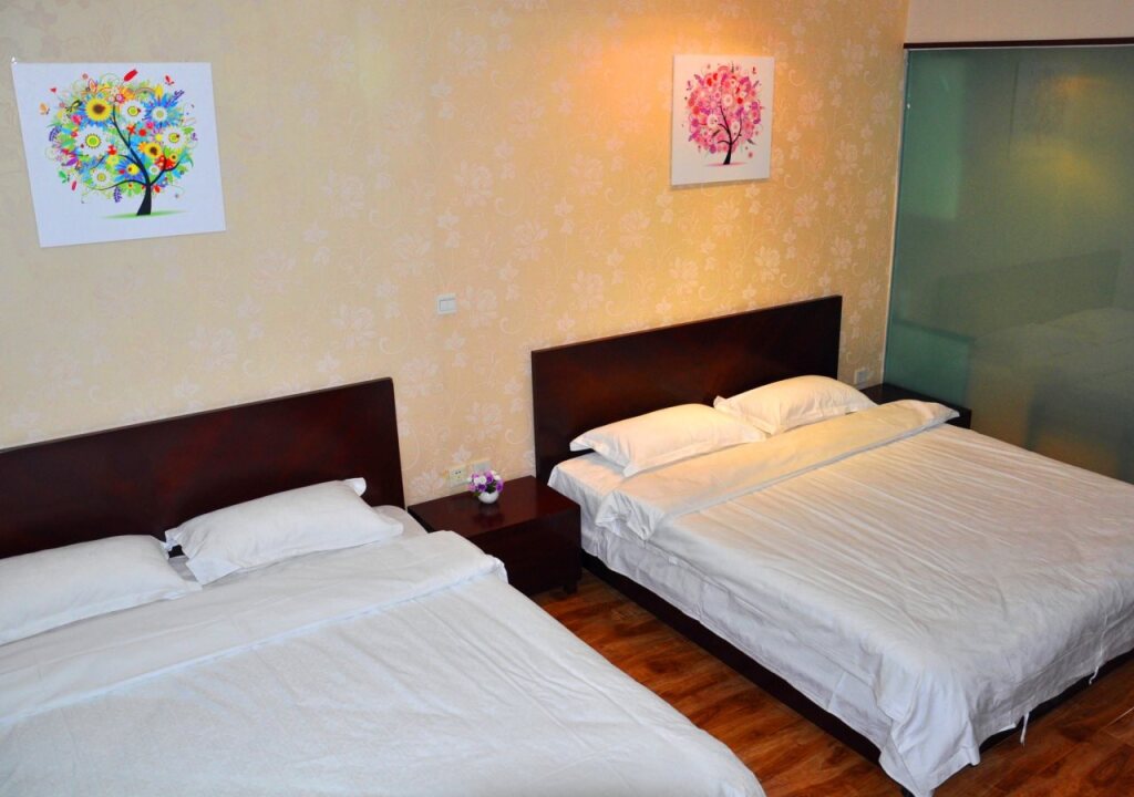Циндао: QingDao JinShan We Holiday Apt Olympic C