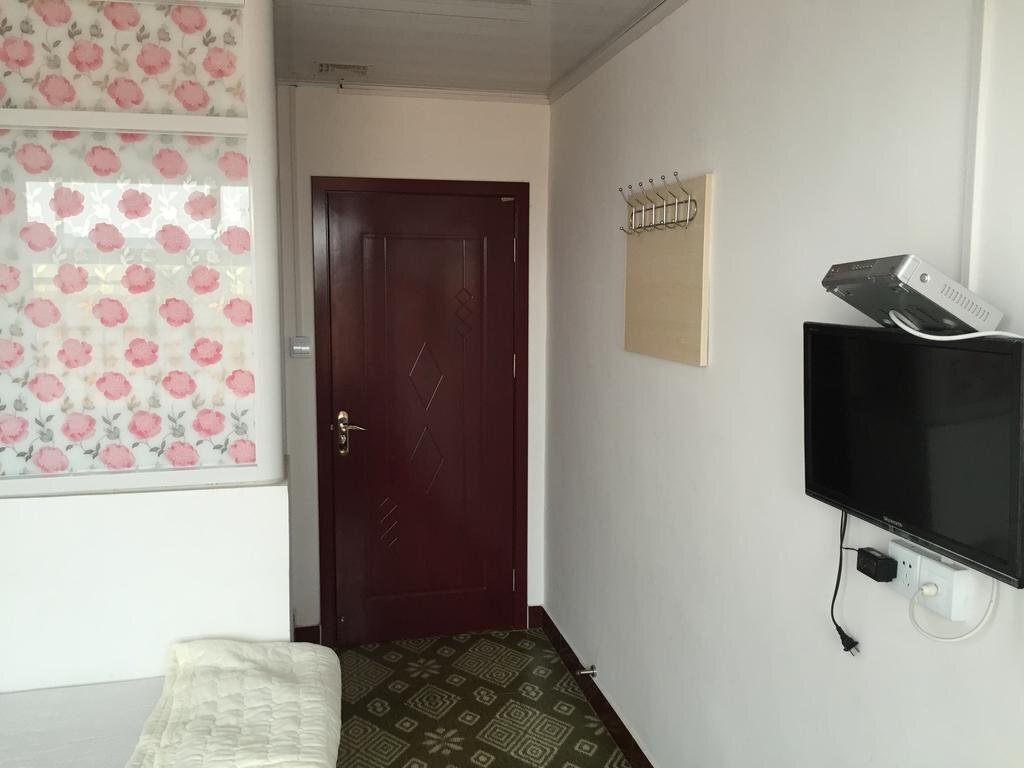 Жичжао: Rizhao Shenglong Fishermans Hotel