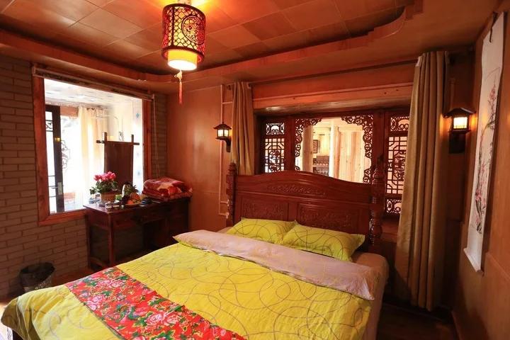 Лицзян: Lijiang Shiwai Taoyuan Inn