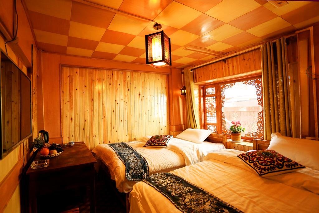Лицзян: Lijiang Shiwai Taoyuan Inn