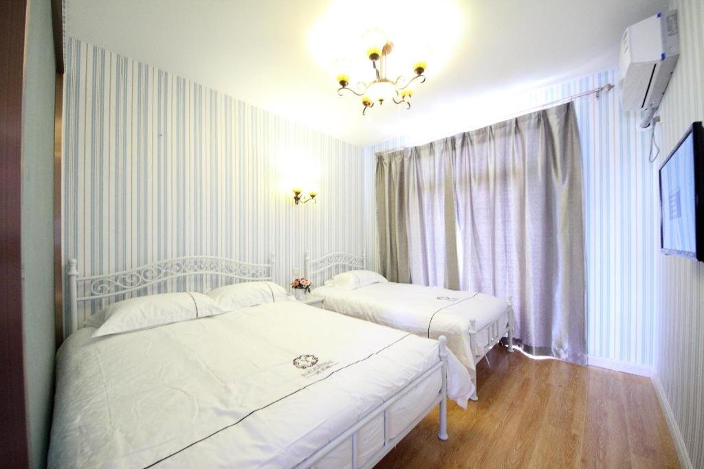 Циньхуандао: Qinhuangdao Youjian Sea Holiday Inn