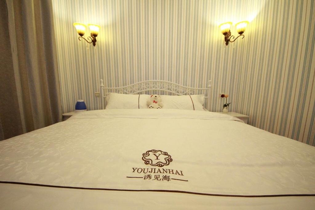 Циньхуандао: Qinhuangdao Youjian Sea Holiday Inn