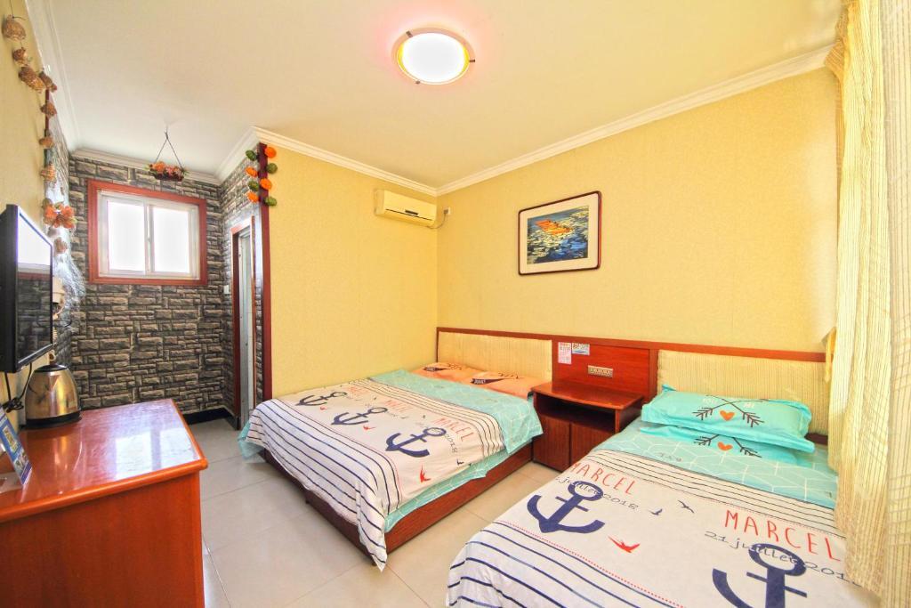 Циньхуандао: Beidaihe Kehaishichun Family Inn