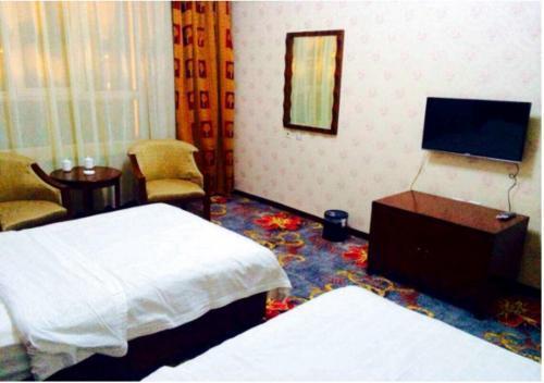 Хулун-Буир: Xiushan International Hotel Bidebao Art Square