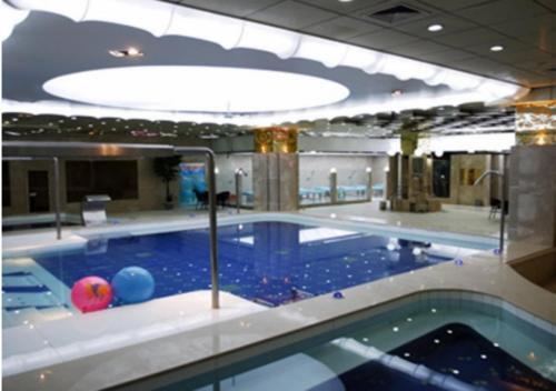 Хулун-Буир: Xiushan International Hotel Bidebao Art Square