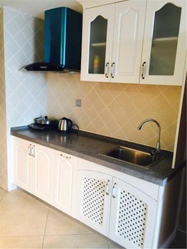 Циньхуандао: Nandaihe Zilanxiangjun Seaview Apartment