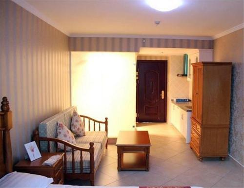 Циньхуандао: Nandaihe Zilanxiangjun Seaview Apartment